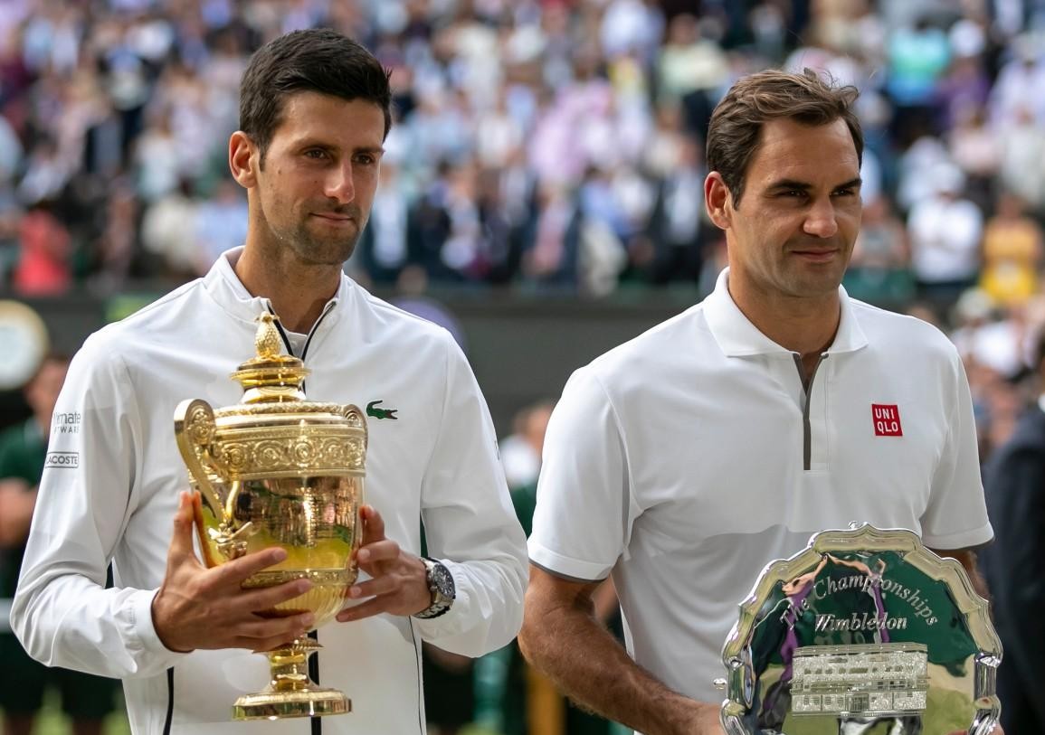 西班牙网球队鏖战德国网球队，费德勒送出助攻